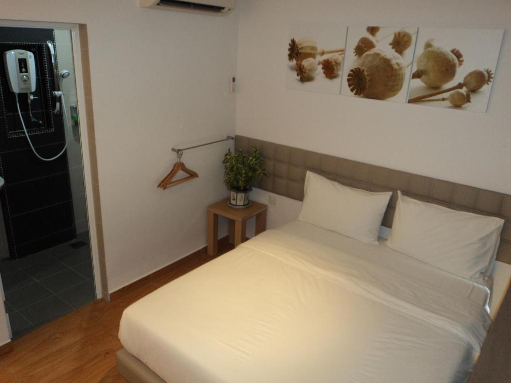 Gm City Hotel Кланг Стая снимка